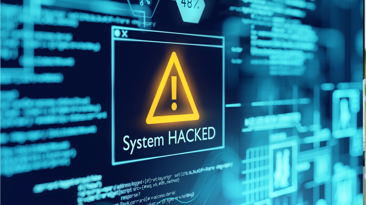 Man sieht einen Bildschirm, auf dem angezeigt wird, dass das System gehackt wurde.