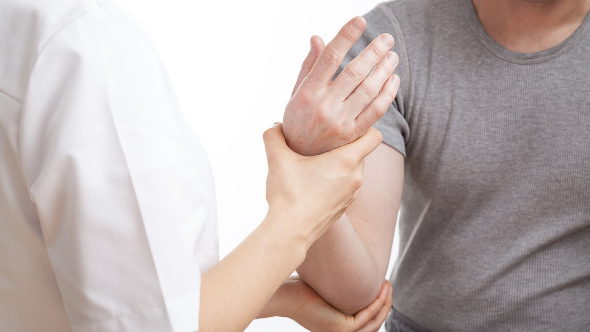 Physiotherapeut mit Patient