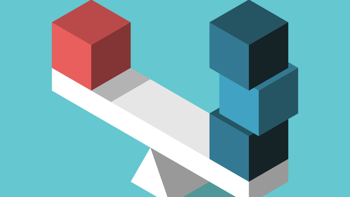 Würfel auf einer Waage