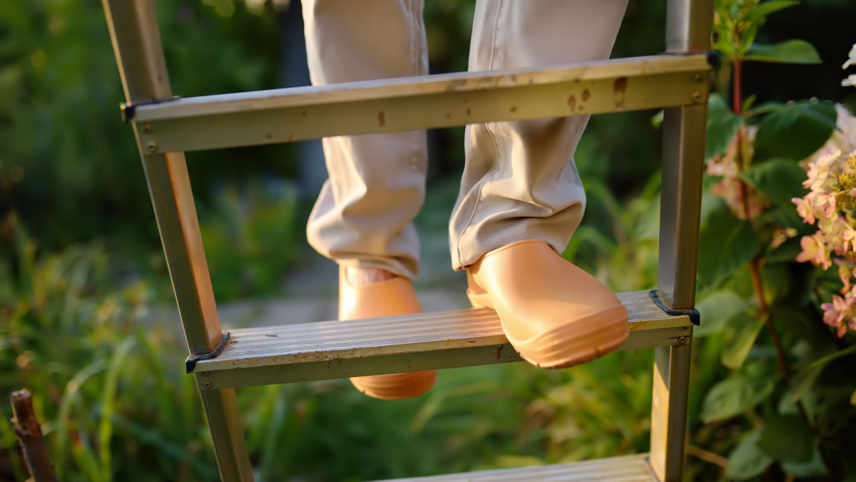 Mensch auf einer Leiter